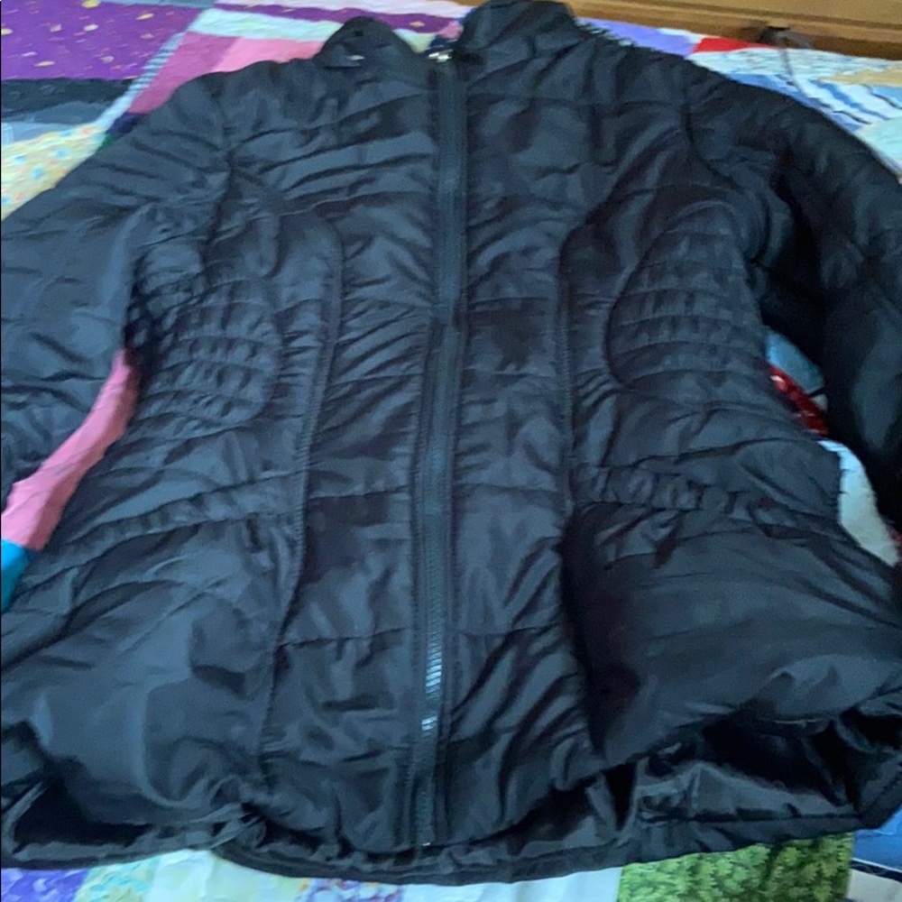 Black coat small rip that that will easy to repair